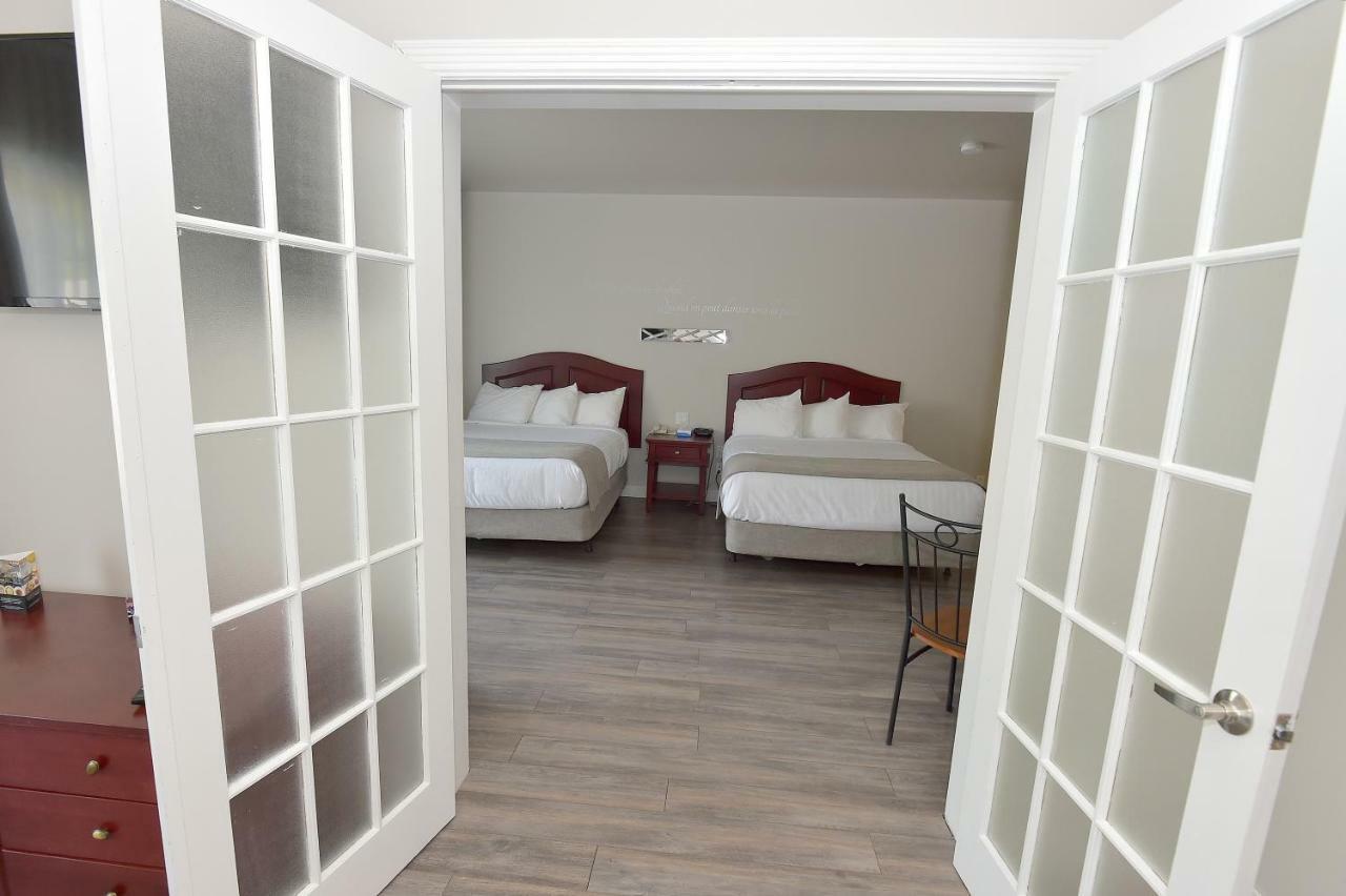 Les Pavillons Du Petit Manoir Du Casino Hotell La Malbaie Exteriör bild